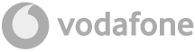 Vodafone logo with a gray speech mark symbol to the left of the word "vodafone" in lowercase, also in gray, on a transparent background.